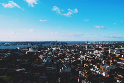 Aerial view of cityscape against sky