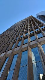 Low angle view of building against blue sky