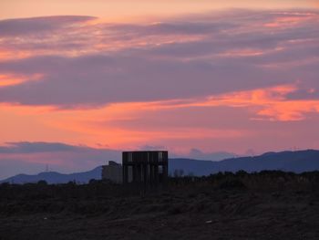 Scenic view of dramatic sky during sunset