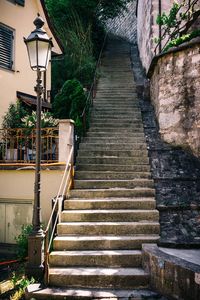 Staircase by building against sky