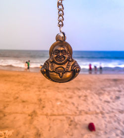 View of person on beach against sky