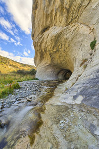 Scenic view of rock formation against sky