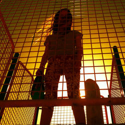 Silhouette of woman at sunset