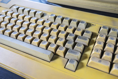 High angle view of computer keyboard on table