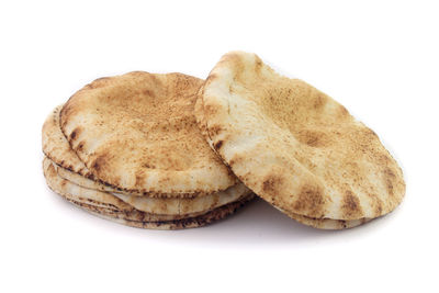 Close-up of cookies against white background