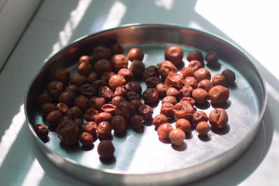 High angle view of fruits in bowl on table