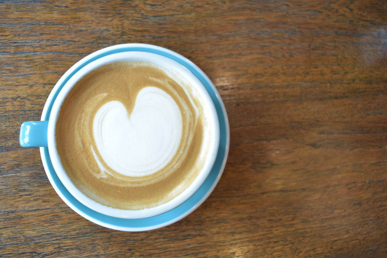 HIGH ANGLE VIEW OF COFFEE ON TABLE