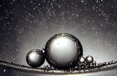 Close-up of raindrops on glass window