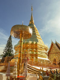 Low angle view of pagoda against building