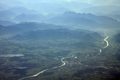 Aerial view of mountains against sky