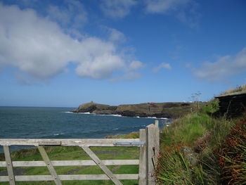 Scenic view of sea against blue sky