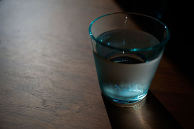 High angle view of drink in glass on table