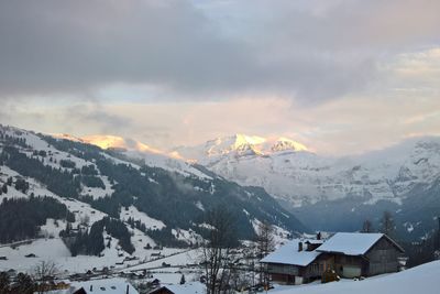 Scenic view of snowcapped mountains against sky