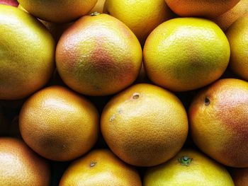 Full frame shot of oranges in market