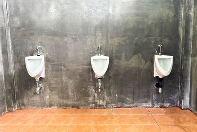 View of umbrellas in bathroom