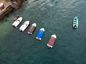 High angle view of boats moored on river