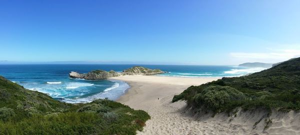 Scenic view of robberg nature reserve against clear sky