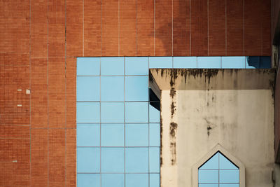 Reflection of building on glass window