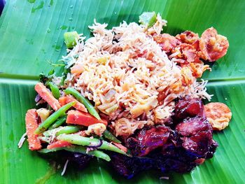 High angle view of food on leaves