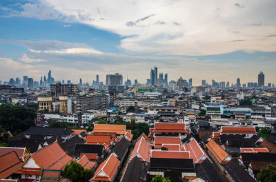 High angle view of buildings in city against sky