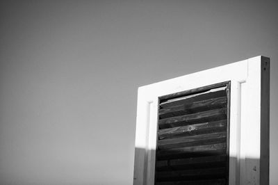 Close-up of wood against clear sky