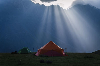 Tent on mountain against sky