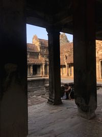 View of historical building seen through arch