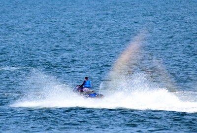 Man surfing in sea