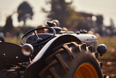 Close-up of tractor on field