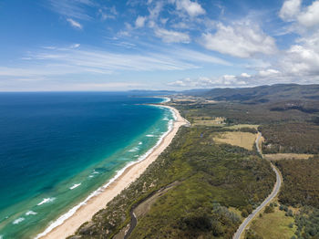 Aerial drone view of lagoons beach conservation area and a3 tasman highway, east coast of tasmania