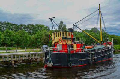 Ship in water against sky