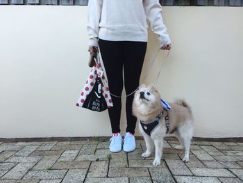 Full length of woman standing in park