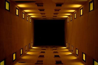 Illuminated corridor of building