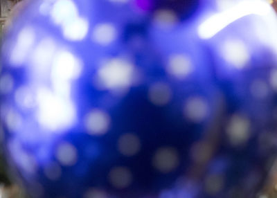 Defocused image of illuminated blurred background