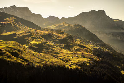 Scenic view of mountains against sky during sunset