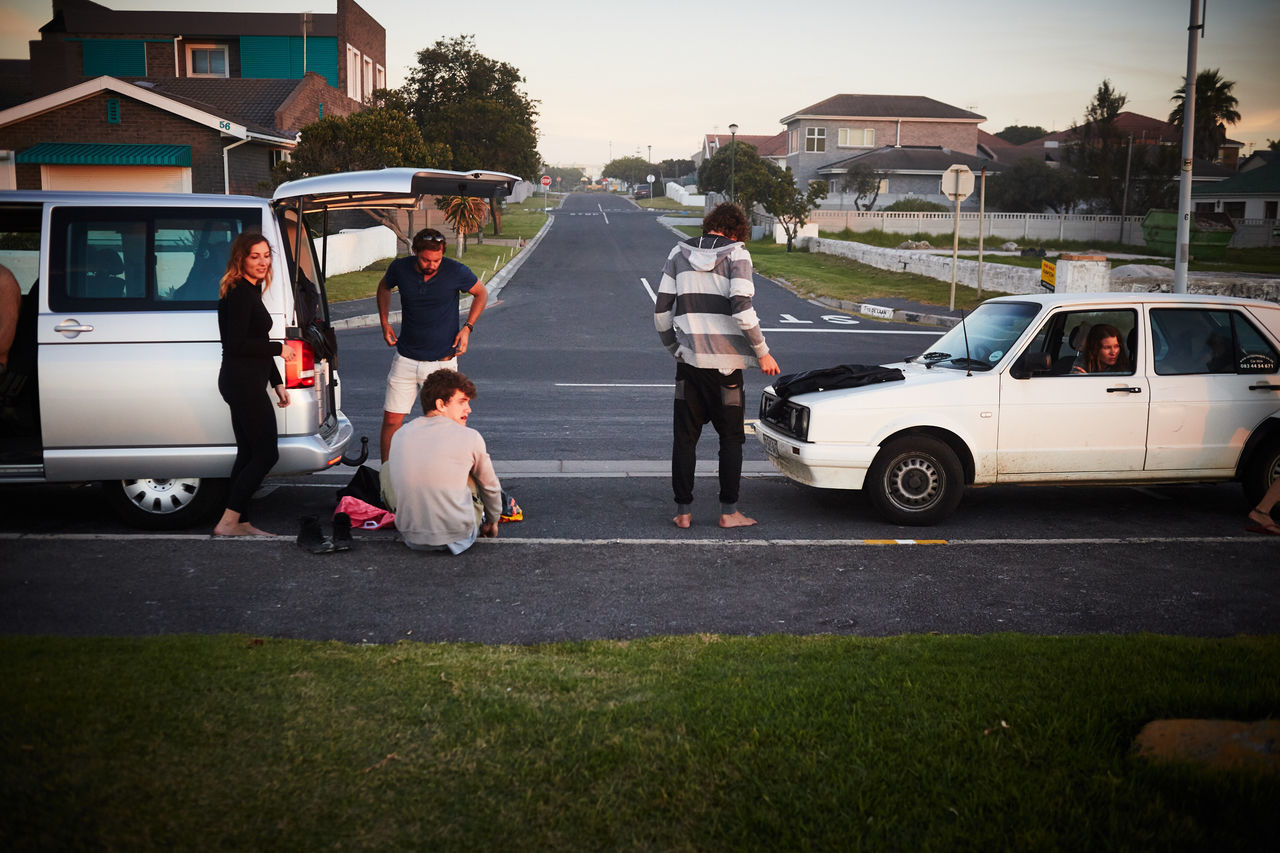 HIGH ANGLE VIEW OF CHILDREN ON ROAD