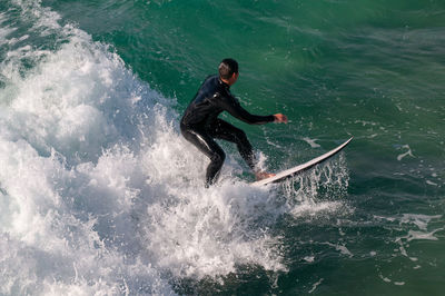 Man surfing in sea