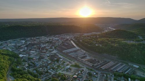 High angle view of townscape against sky during sunset