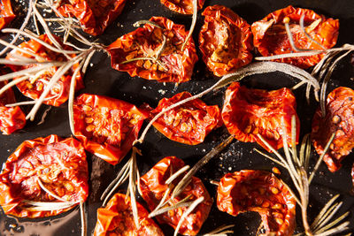 High angle view of meat on barbecue grill
