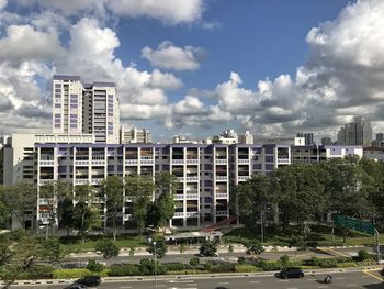 Buildings in city against sky