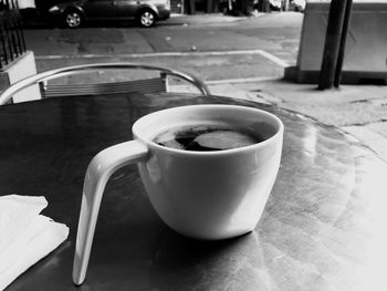 Close-up of coffee cup on table