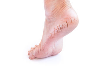 Close-up of woman hand on white background