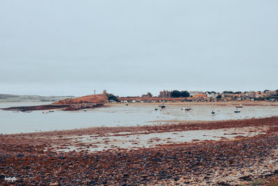 Scenic view of beach against sky