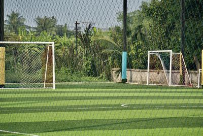 Soccer field seen through net
