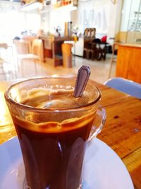 Close-up of coffee served on table