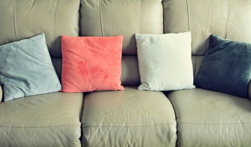 High angle view of sofa on bed at home