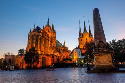 View of illuminated cathedral against sky