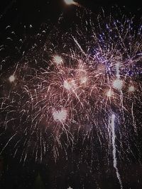 Low angle view of firework display