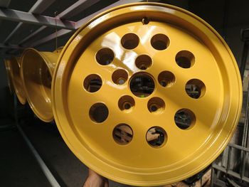 Close-up view of yellow wheel