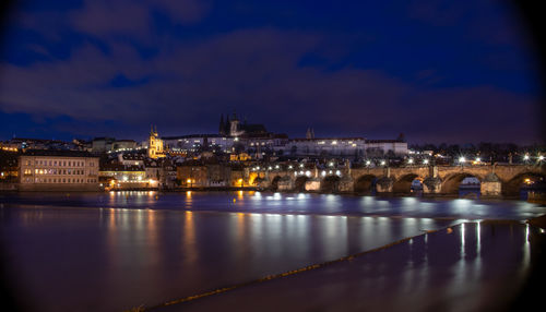 Illuminated buildings in city at night